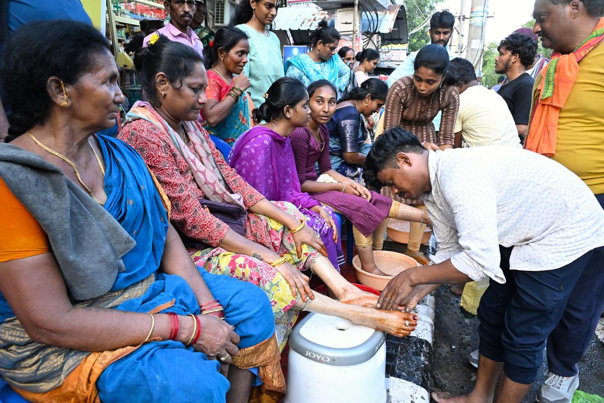 A few NGOs set up stalls providing oil massage to help relieve the fatigue of the devotees taking part in Giri Pradakshina in Visakhapatnam on Wednesday.