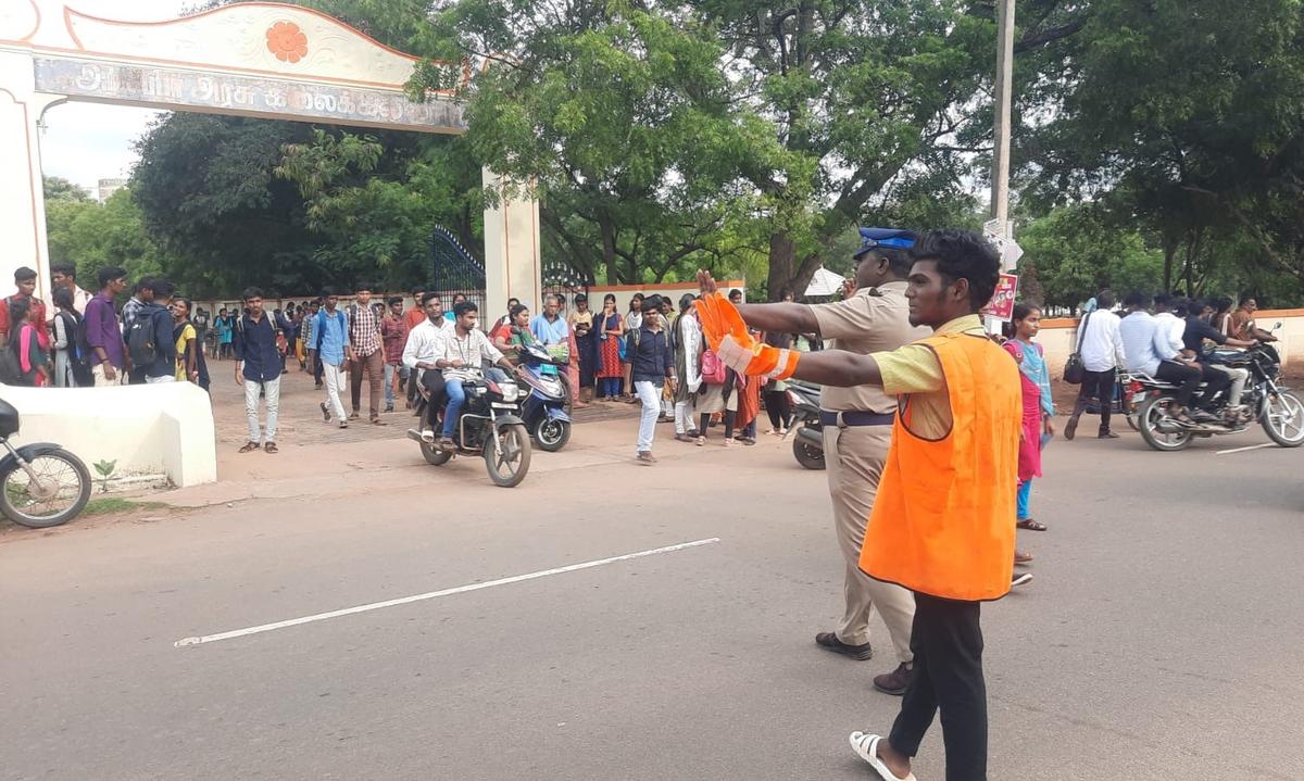 Student asked to regulate traffic as punishment for performing bike stunt
