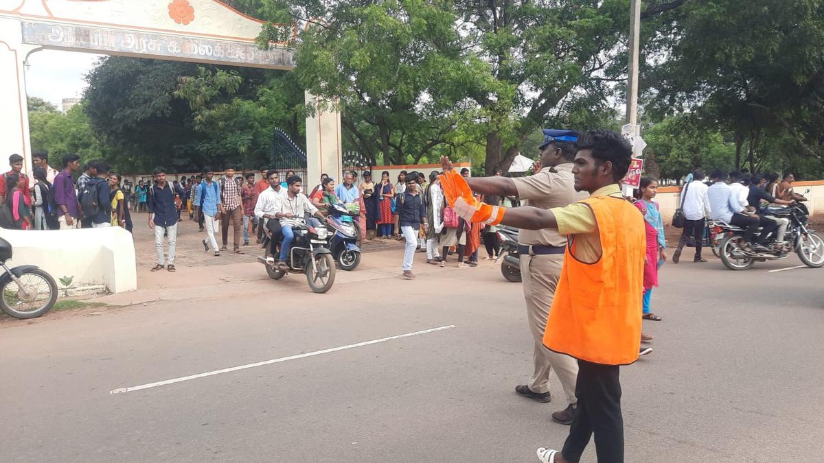 Student asked to regulate traffic as punishment for performing bike