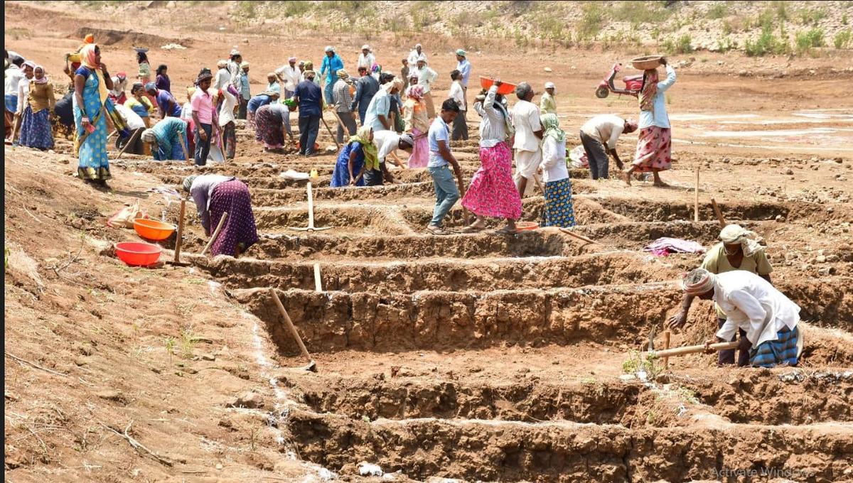 Tank dredging work under Mahatma Gandhi National Rural Employment Guarantee Act (MGNREGA) in progress at Madanbhavi village in Dharwad district on Saturday. 