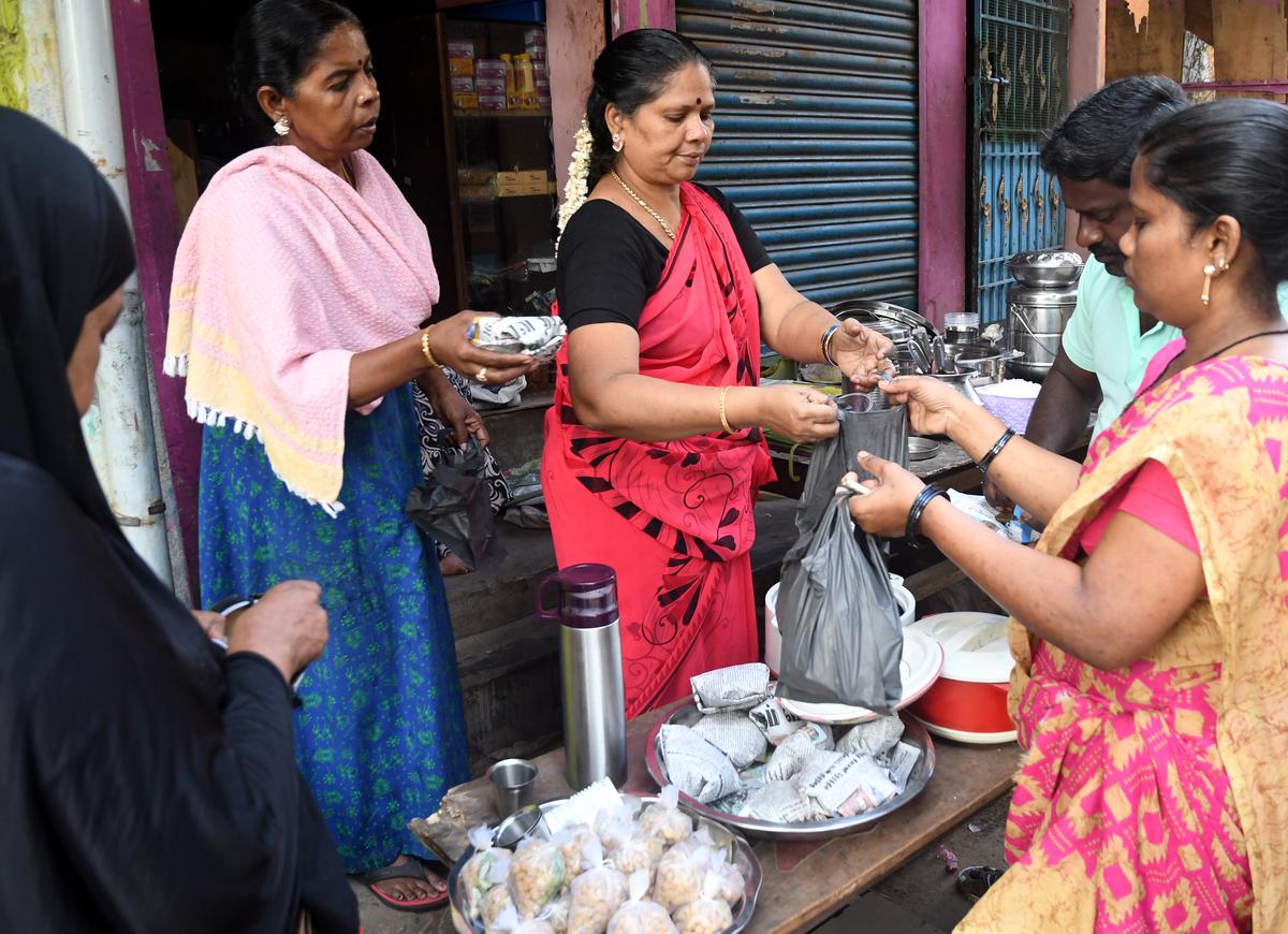 Selvi offers mopeto, which is black or white rice flour dough stuffed with grated coconut and country sugar, then wrapped in banana leaf and steamed.