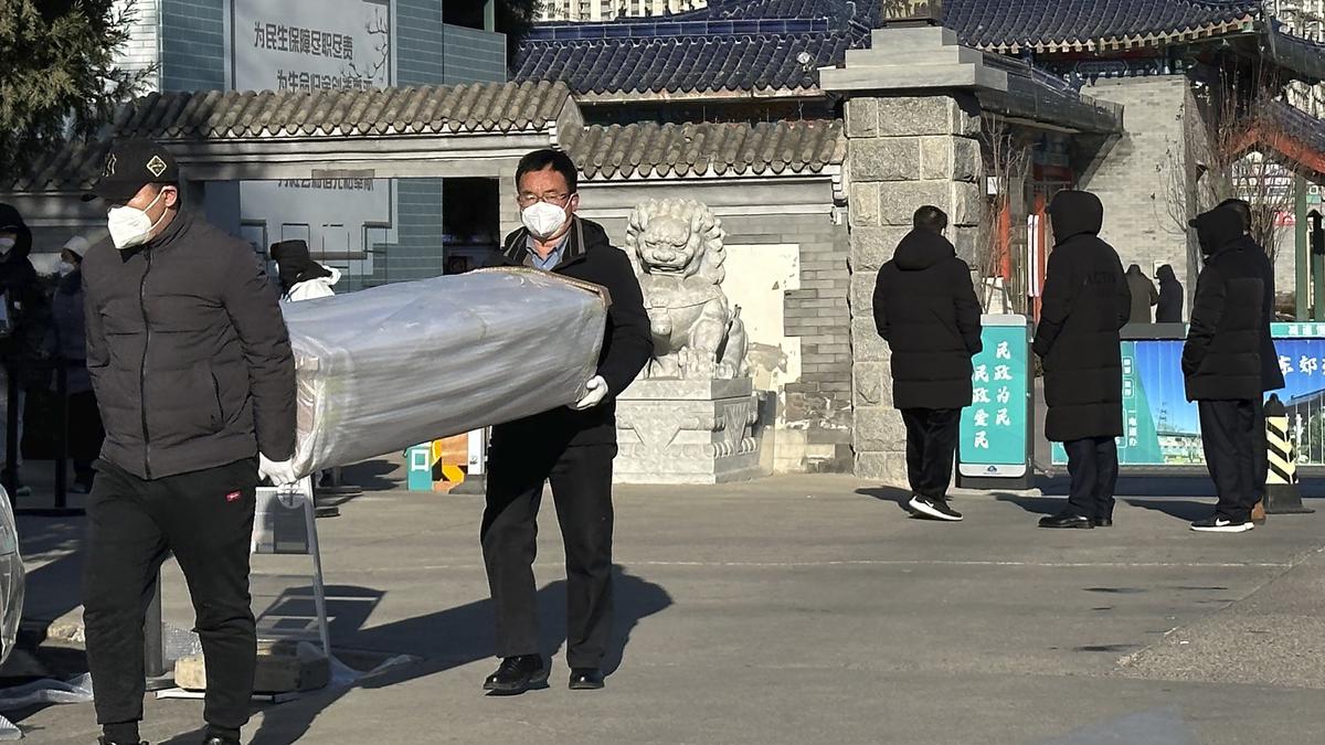 In COVID-hit Beijing, funeral homes with sick workers struggle to keep up