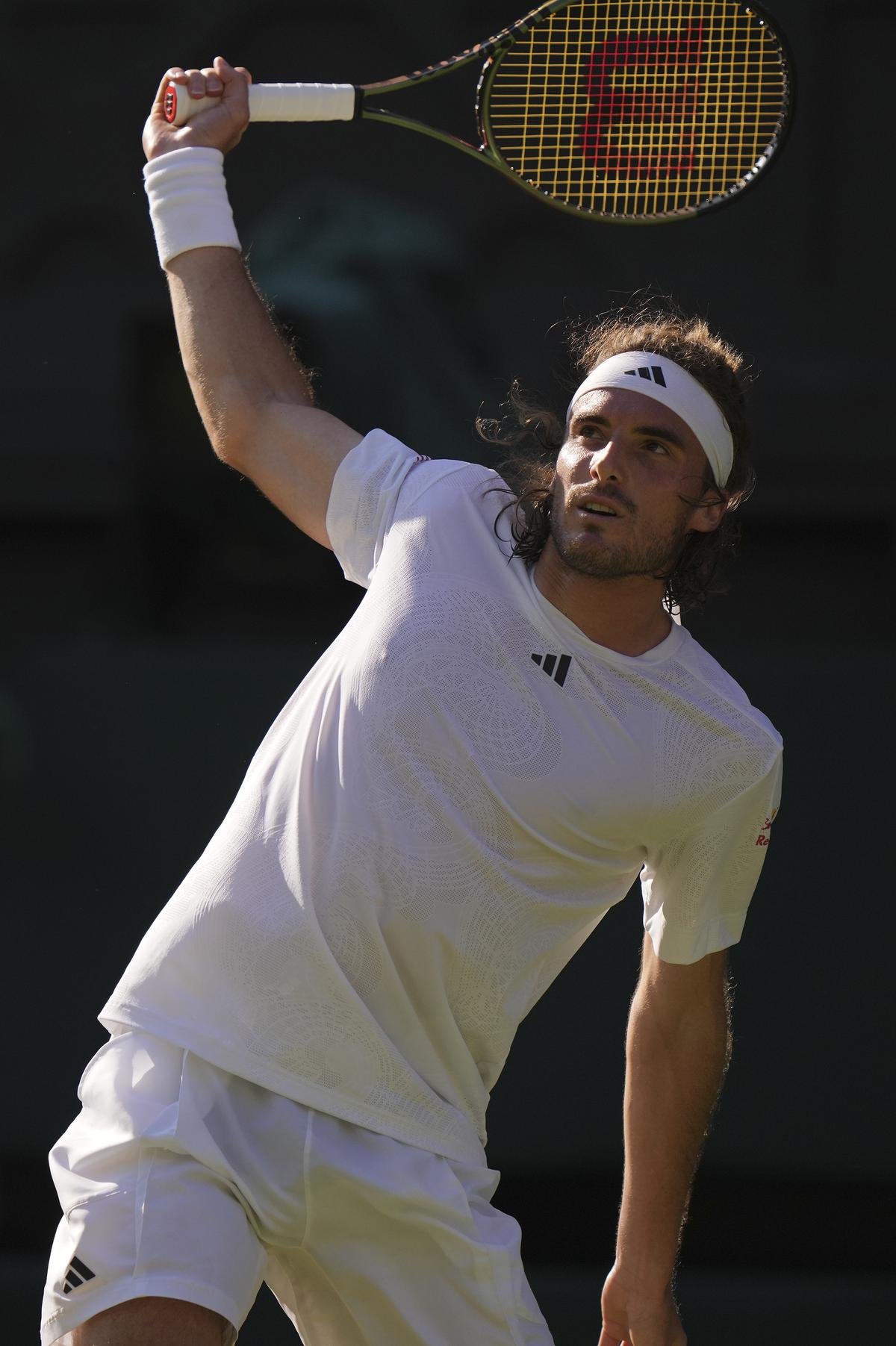 Stefanos Tsitsipas of Greece returns to Britain’s Andy Murray in a men’s singles match on day five of the Wimbledon tennis championships in London on July 7, 2023. 