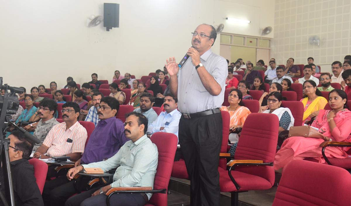A participant raising a question at a workshop at St. Aloysius College, in Mangaluru on Saturday.
