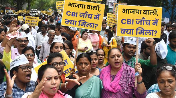 AAP and BJP intensify protests over excise row