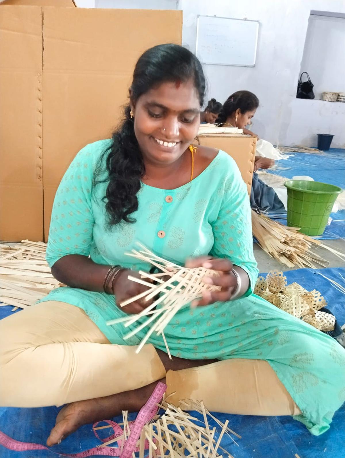 Women making bamboo lanterns for fairy lights in Chamarajanagar in Karnataka 