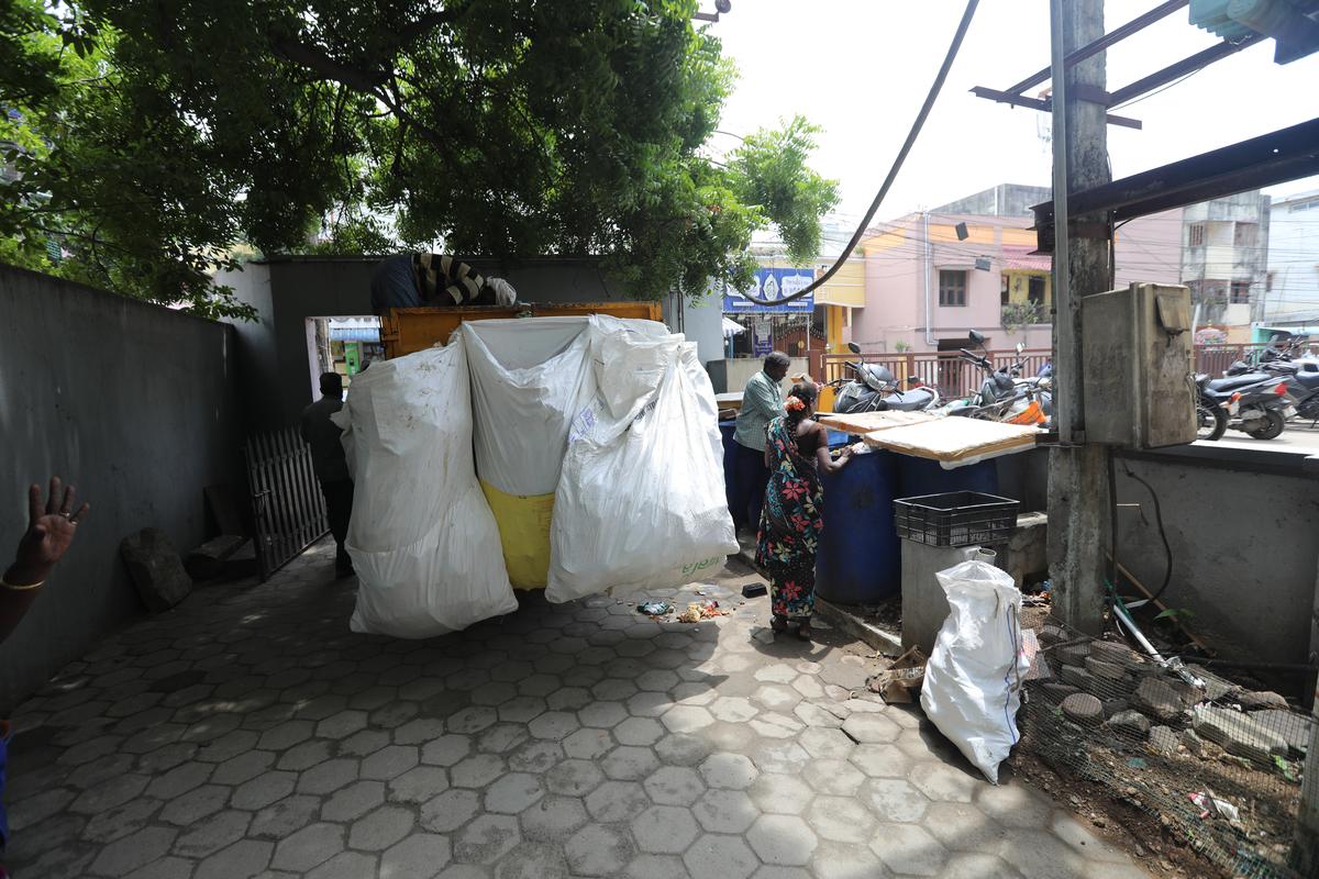 A garbage collection truck of the Tambaram Municipal Corporation at a gated community in Zamin Pallavaram.