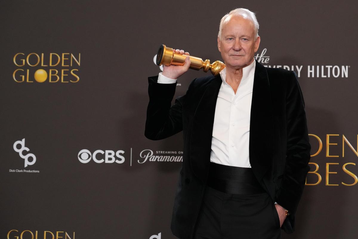 Stellan Skarsgård poses in the press room with the award for best performance by a male actor in a supporting role in any motion picture for ‘Sentimental Value’ during the 83rd Golden Globes