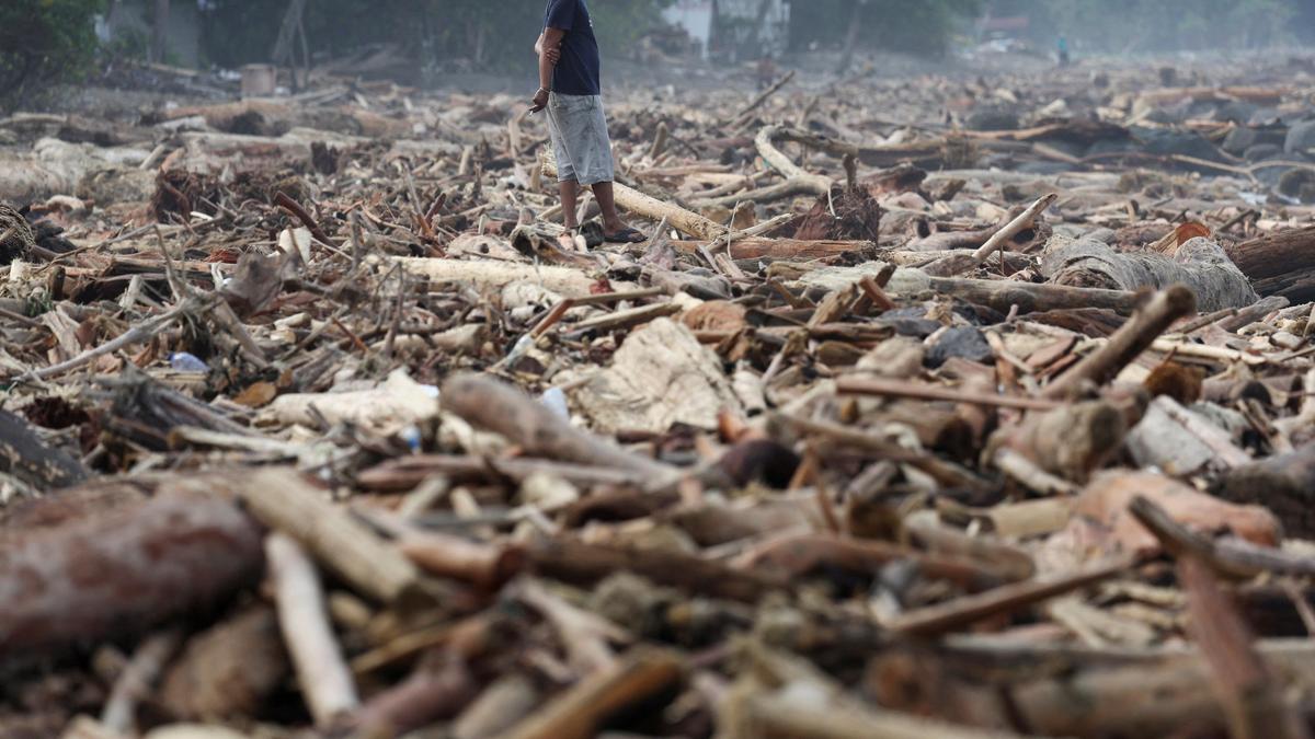 Indonesia’s Sumatra residents loot for food, water after deadly floods