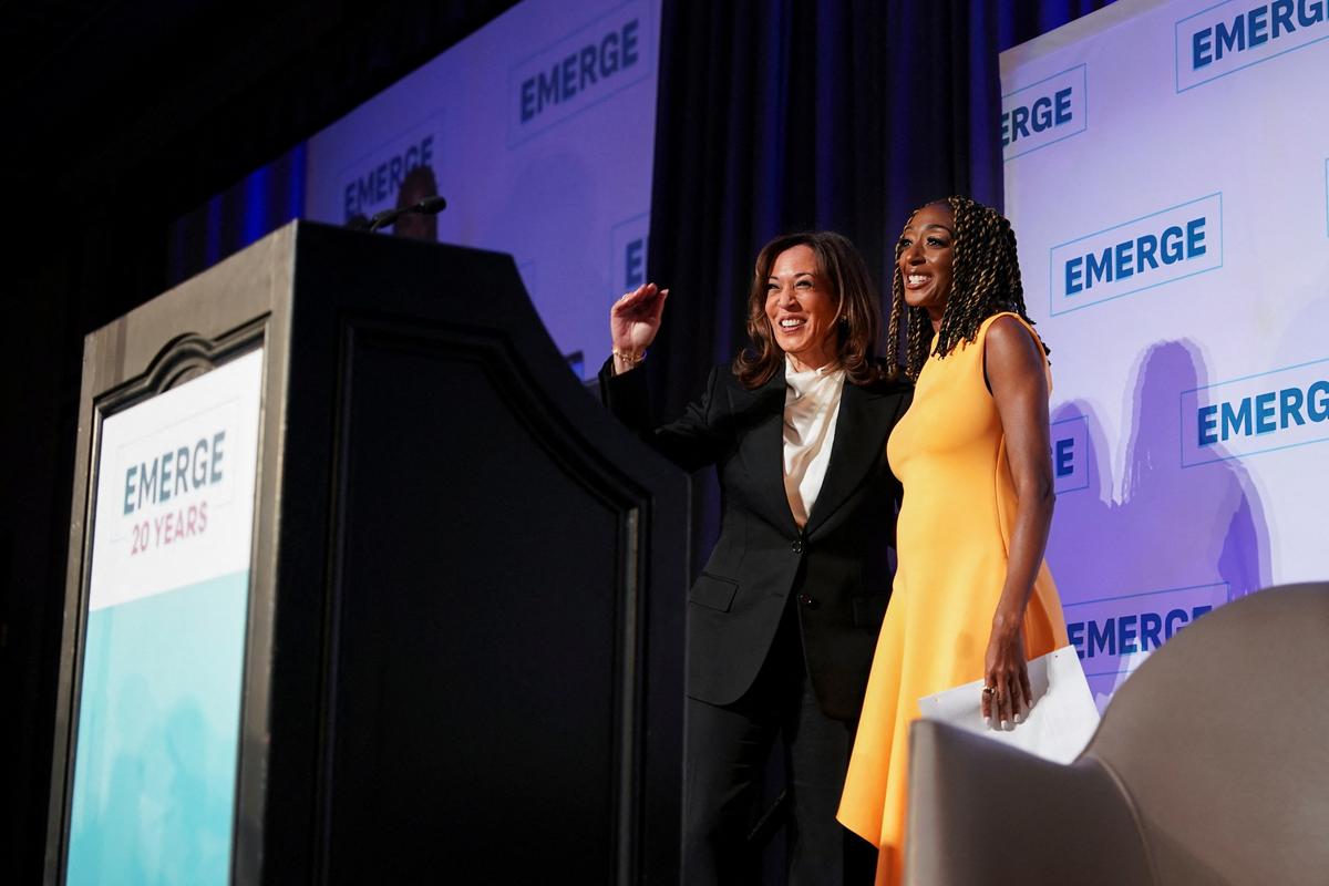 Former U.S. Vice President Kamala Harris, accompanied by Emerge President and CEO A’shanti Gholar, attends a gala in San Francisco, California, U.S.