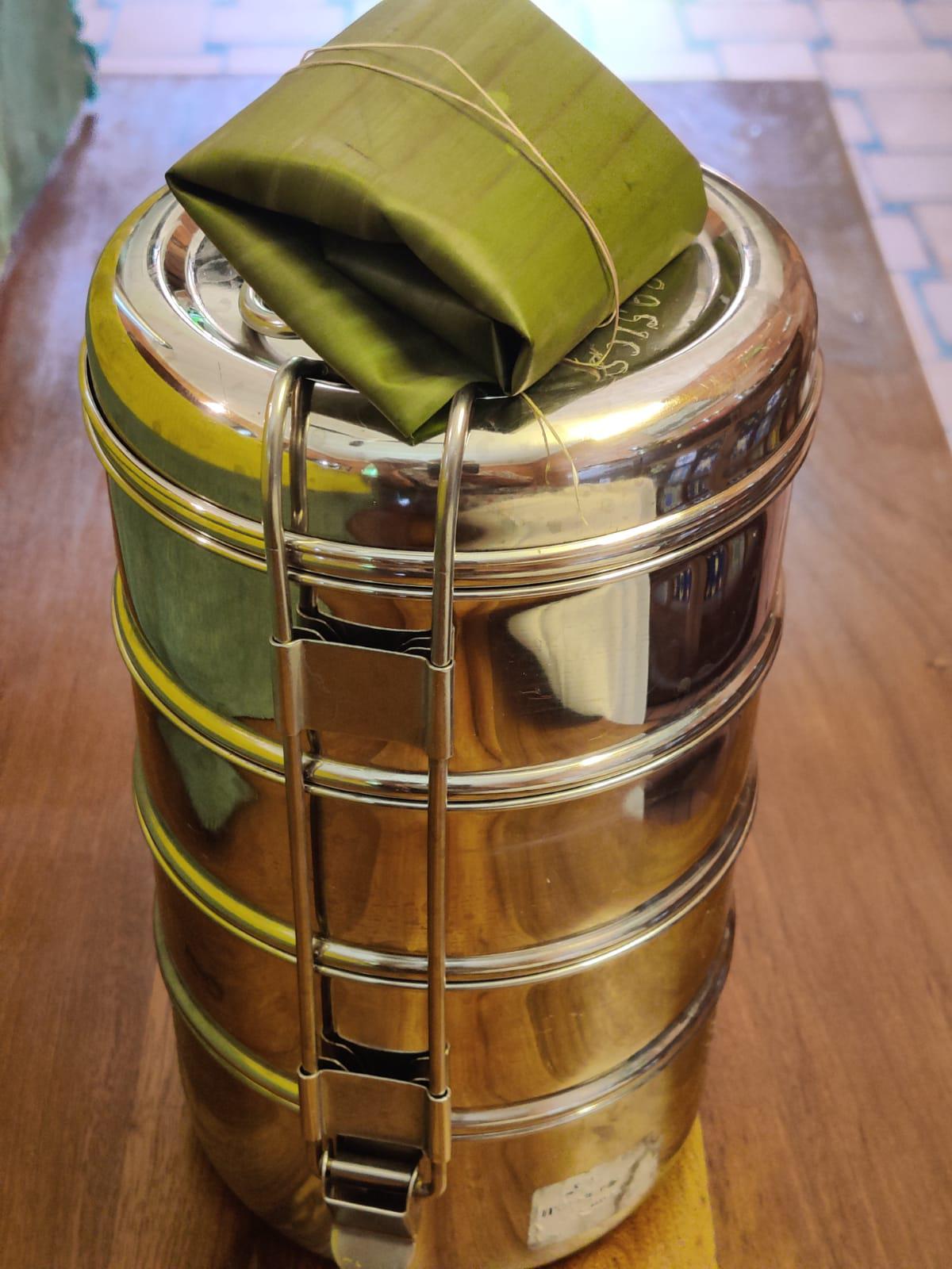 The meal comes packed in a gleaming steel dabba along with a plantain leaf pothi 