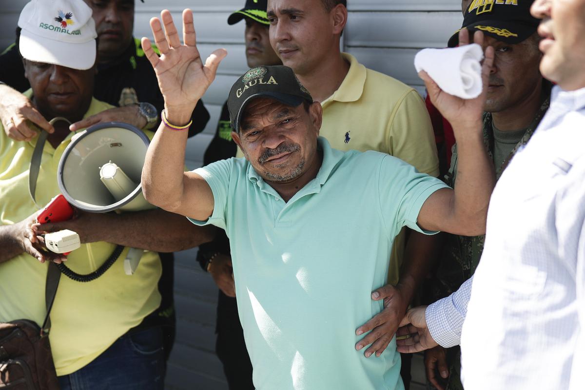 Luis Manuel Díaz waves to neighbors outside his home in Barrancas, Colombia, after he was released by kidnappers Thursday, Nov. 9, 2023. Díaz, the father of Liverpool striker Luis Díaz, was kidnapped on Oct. 28 by the guerrilla group National Liberation Army, or ELN. 