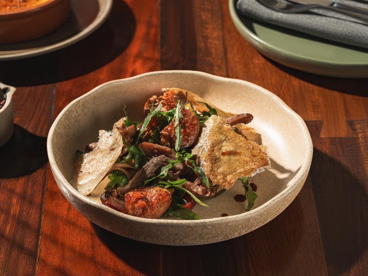 The pulled duck and arugula The pulled duck and arugula