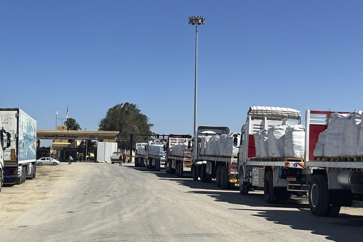 Trucks line up at the Egyptian side of the Rafah border crossing between Egypt and the Gaza Strip on March 2, 2025.