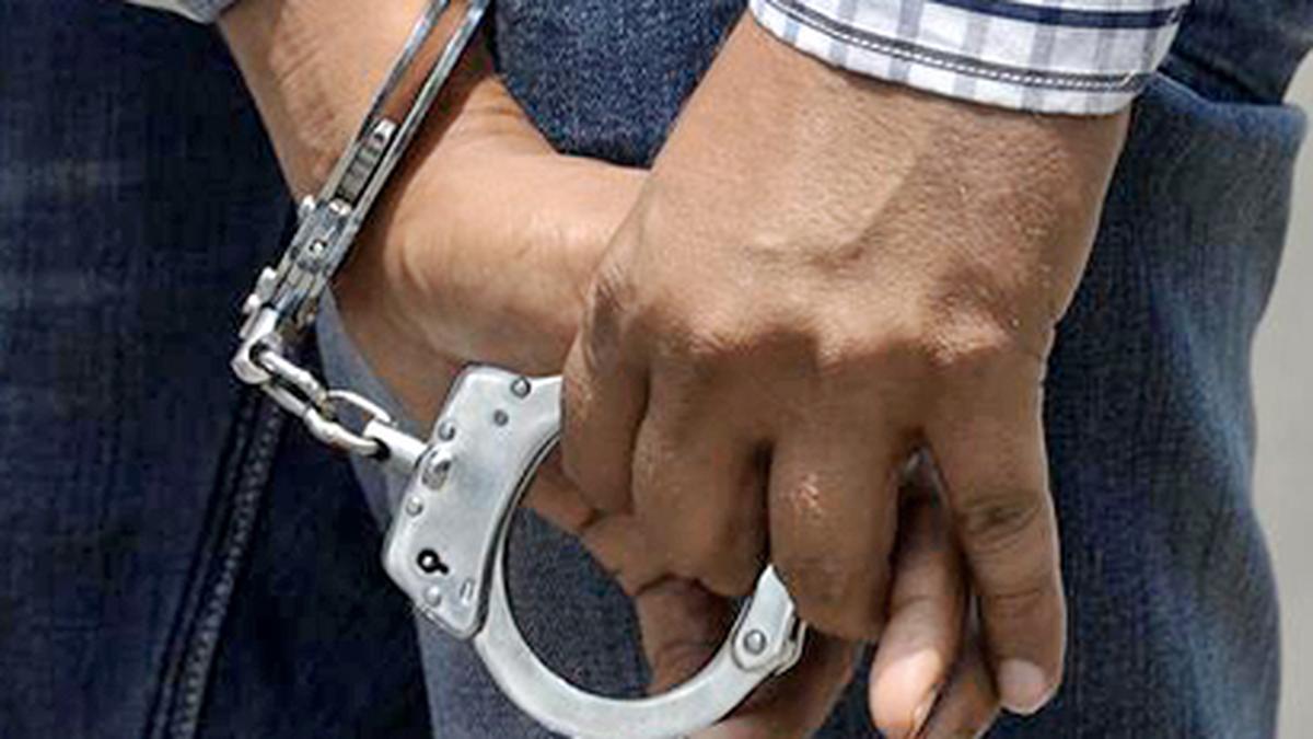 https://th-i.thgim.com/public/incoming/2halhv/article69656404.ece/alternates/LANDSCAPE_1200/IMG_vbk-HANDCUFF-arrest_1_1_CJ91FP0D.jpg