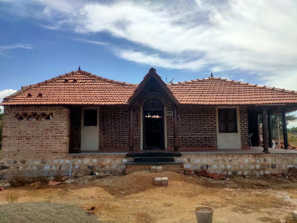 A house under construction by Aravind Manoharan.