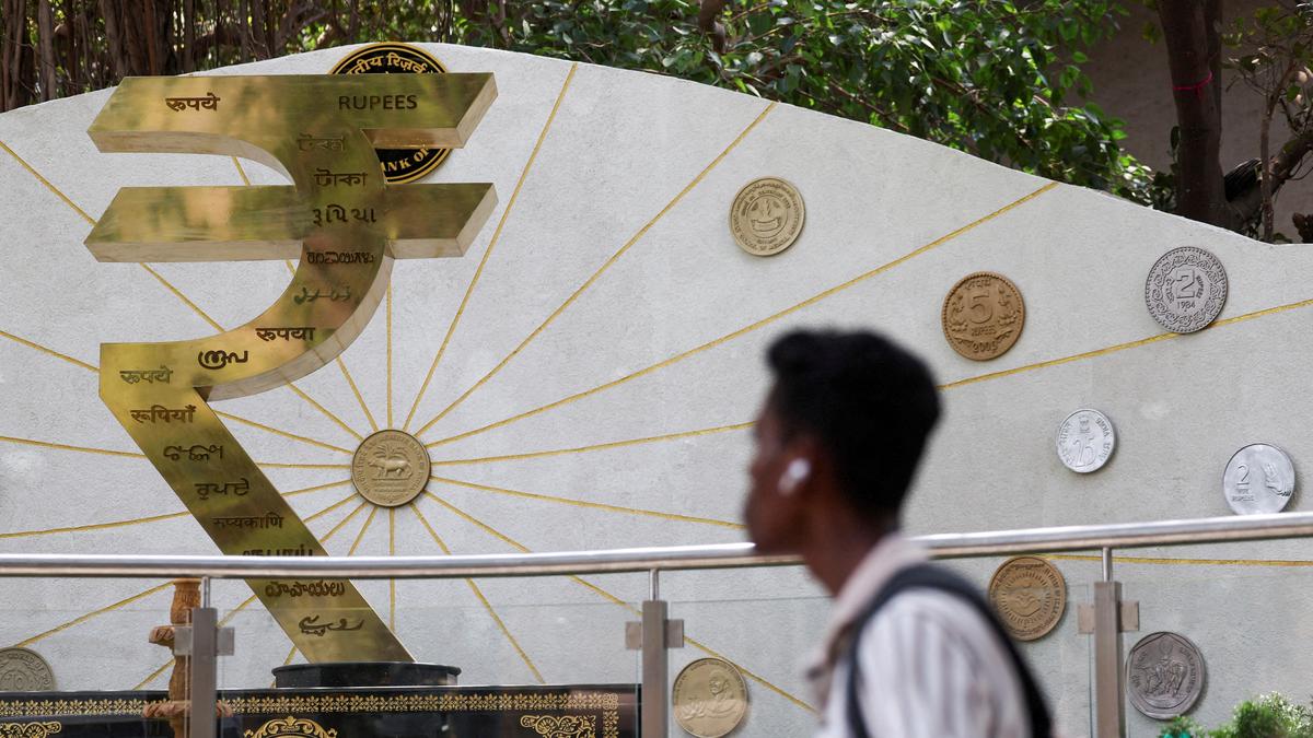 Rupee hits lowest-ever level of 92.02 against U.S. dollar; ends with marginal gain