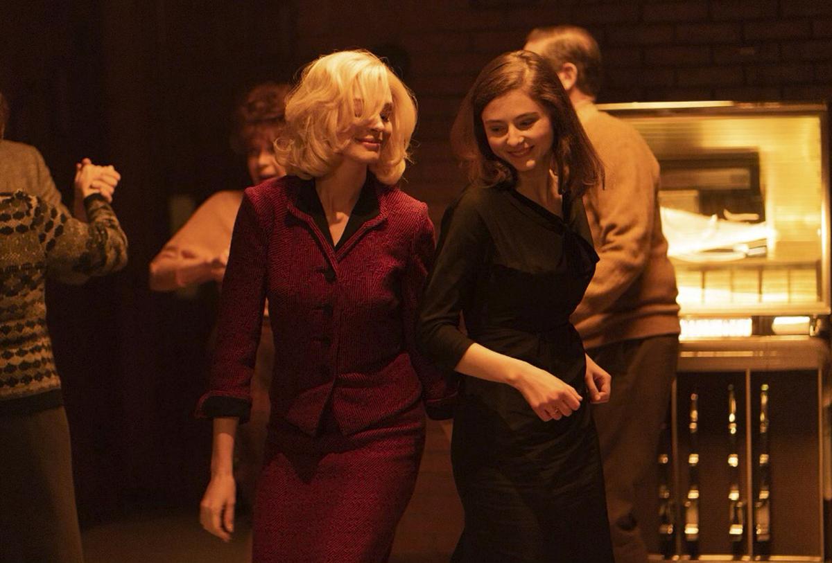 This image released by the Sundance Institute shows Anne Hathaway, left, and Thomasin McKenzie in a scene from ‘Eileen,’ which will be featured at the 2023 Sundance Film Festival
