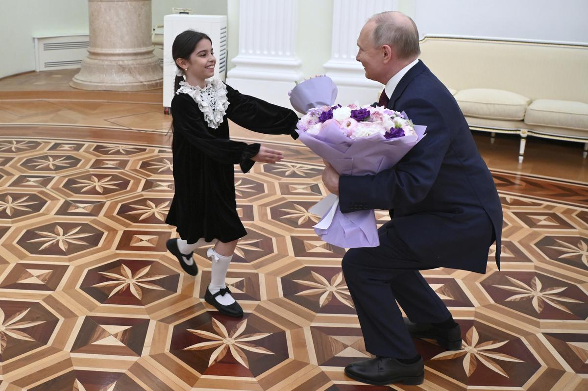 Vladimir Putin Putin Showcases Caring Character by hosting an 8-year old at Kremlin