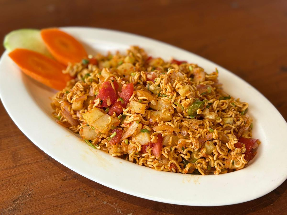 Nepalese dish Wai wai sadeko served at Everest Thakali in Majni ka Tila.