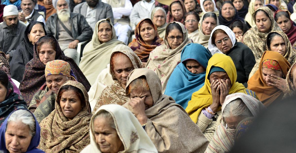 Family members of the victims of the 1984 anti-Sikh riots at a gathering in New Delhi. Family members of the victims of the 1984 anti-Sikh riots at a gathering in New Delhi.