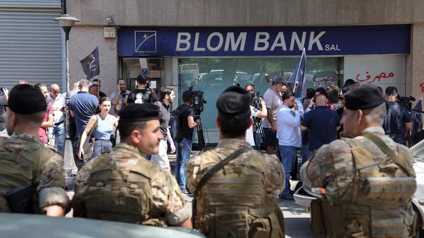 Explained | Lebanon’s economic meltdown and why people are robbing banks for their own money
