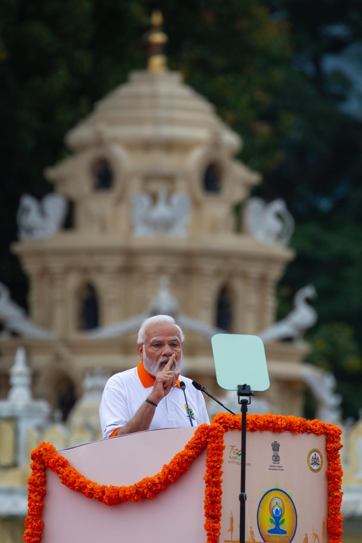 Prime Minister Narendra Modi addresses a gathering in front of the Mysore Palace during the International Day of Yoga celebrations, on June 21, 2022, in Mysuru, India.