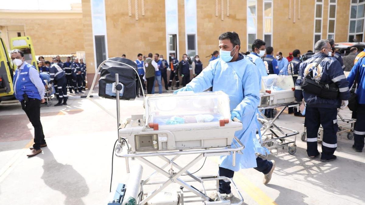 Israeli forces battle militants around another Gaza hospital as babies evacuated to Egypt
