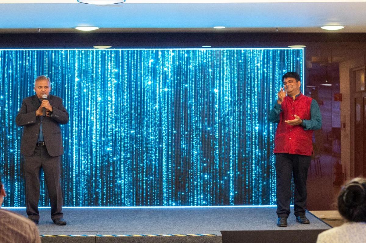 Arun Sriram and an ISL interpreter at one of his sets Arun Sriram and an ISL interpreter at one of his sets