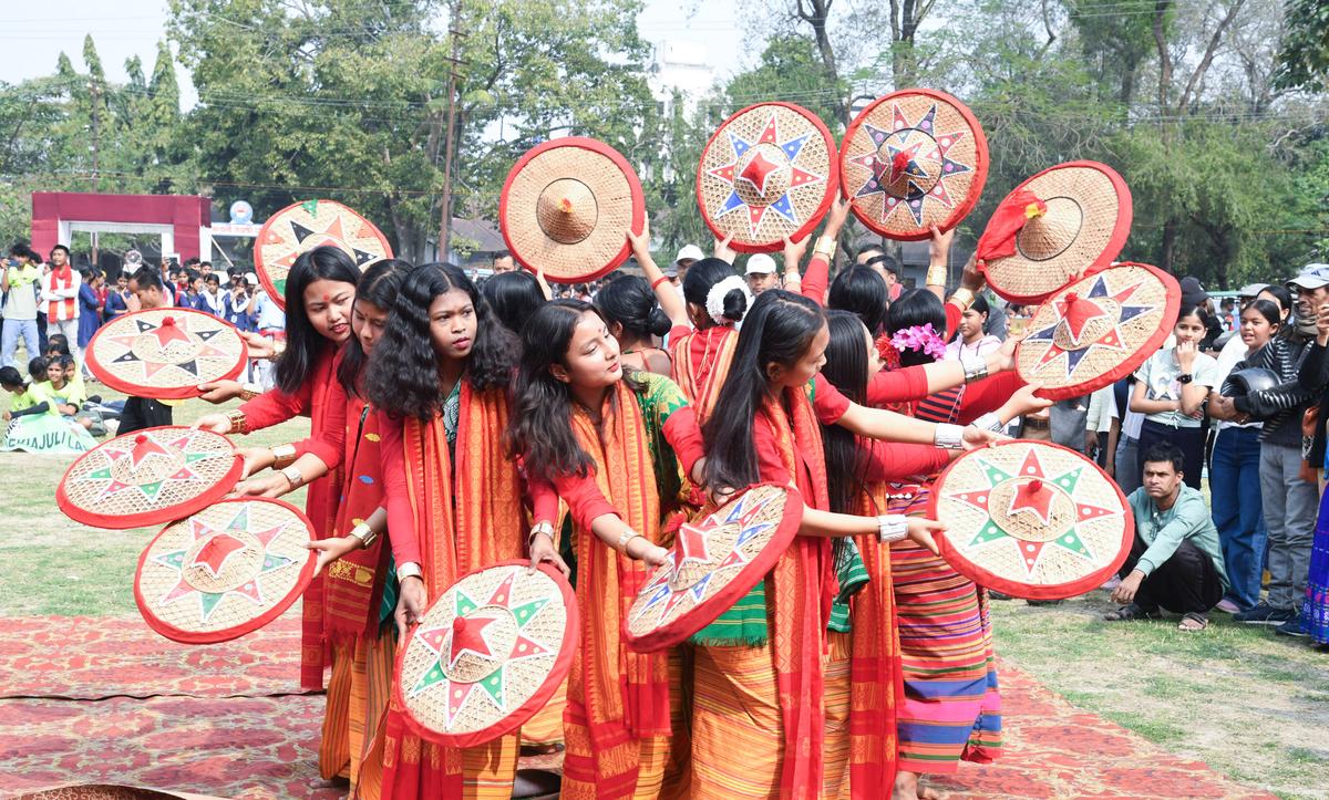 Artists perform the Japi dance in Tezpur