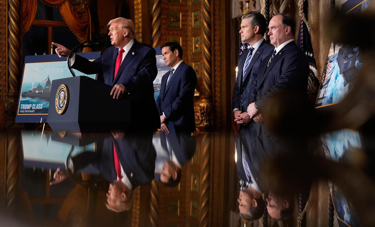 President Donald Trump speaks, with from left, Secretary of State Marco Rubio, Defense Secretary Pete Hegseth and Secretary of the Navy John Phelan, at his Mar-a-Lago club