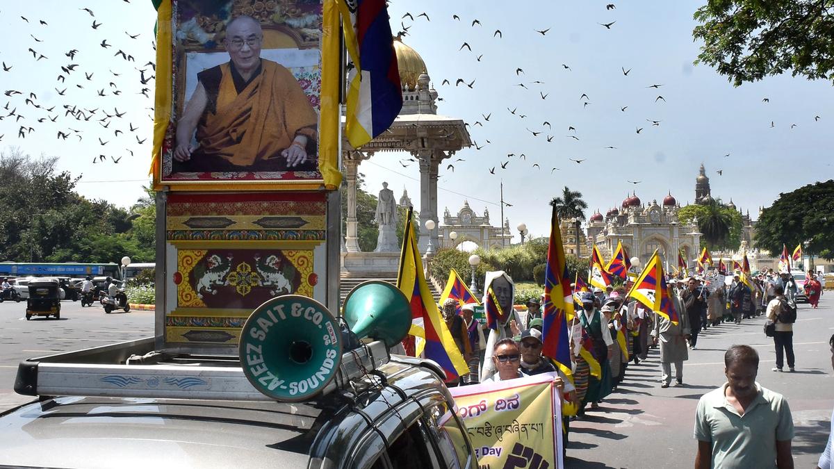 Tibetans take out march to mark National Uprising Day in Mysuru