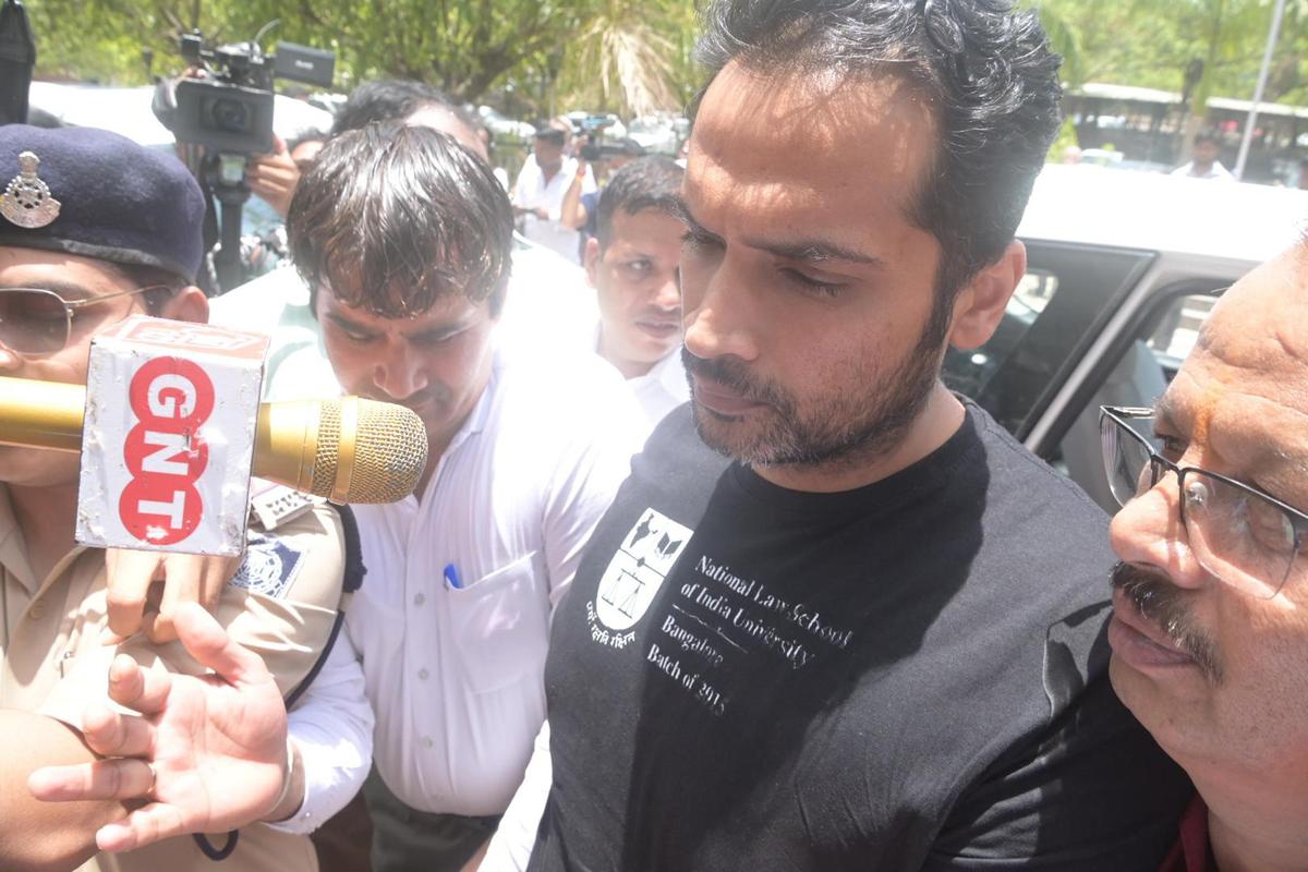 Samarth Singh, husband of Twisha Sharma, is being taken to a court in Bhopal on May 29 in connection with the death and dowry harassment case. Samarth Singh, husband of Twisha Sharma, is being taken to a court in Bhopal on May 29 in connection with the death and dowry harassment case.