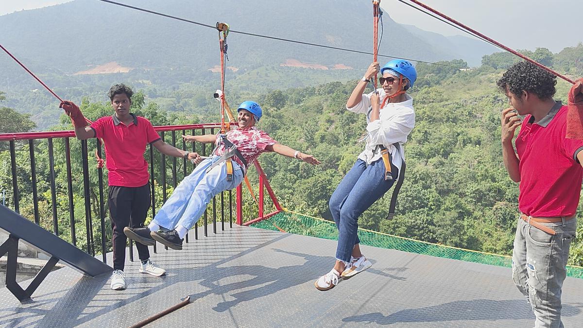 People enjoying a ride of the new zipline at Borra Caves to the other side of the hill, near Visakhapatnam.
