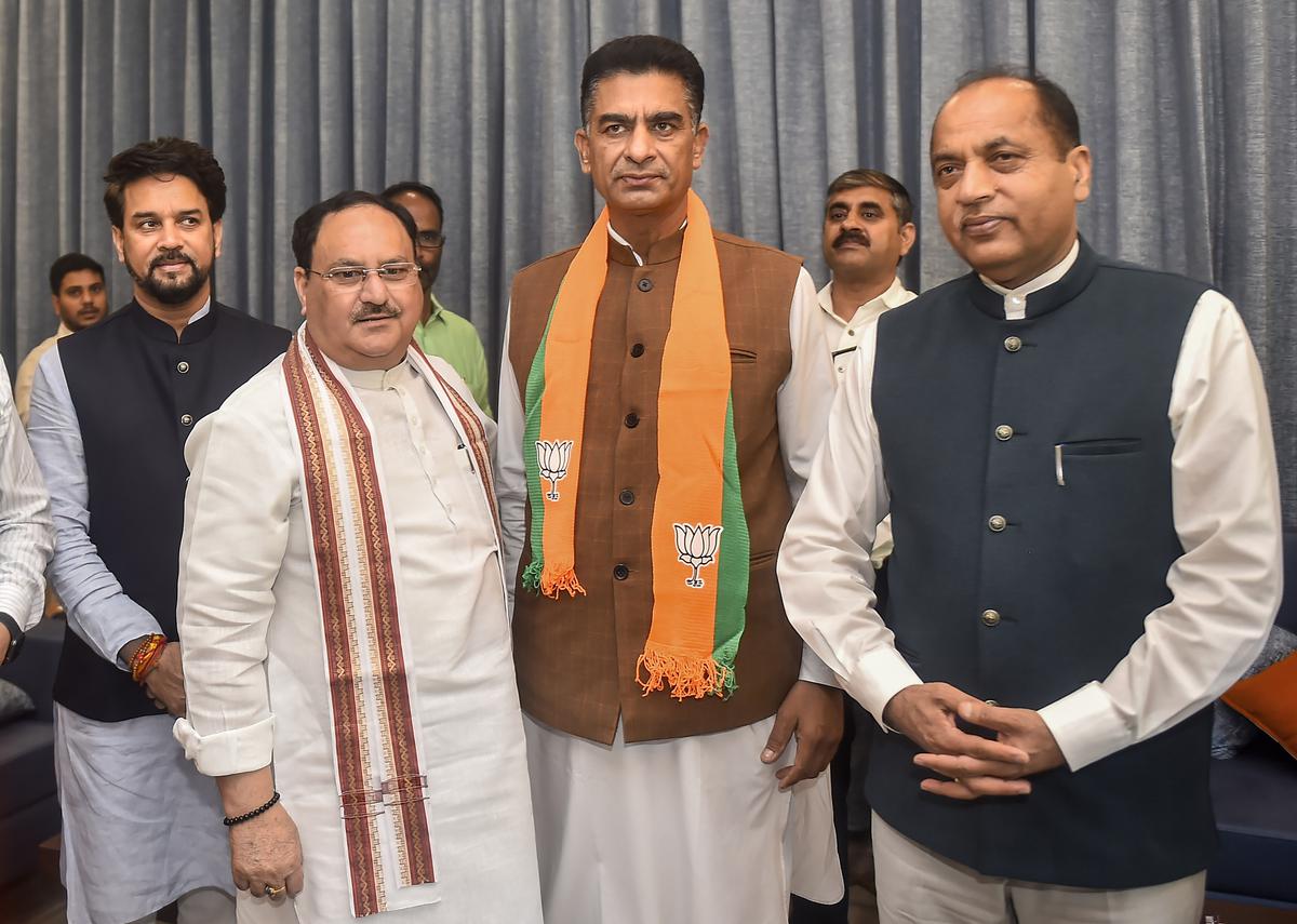 Himachal Pradesh Congress MLAs Lakhvinder Singh Rana and Pawan Kumar Kajal meet BJP National President J. P. Nadda after joining Bharatiya Janata Party (BJP), in New Delhi on August 17, 2022. File