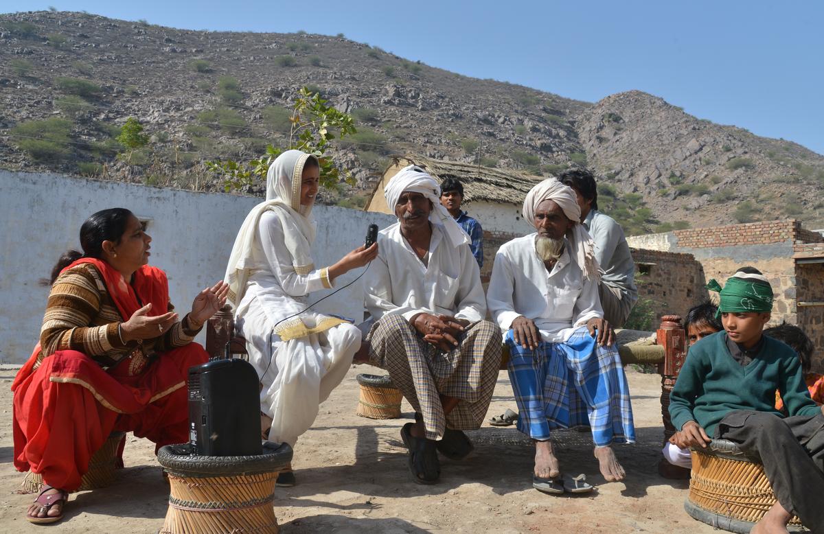 Radio Mewat Reporter Farheen (2L) talked to villagers about their problems at the Kotla village in Nuh District of Haryana. Radio Mewat Reporter Farheen (2L) talked to villagers about their problems at the Kotla village in Nuh District of Haryana.