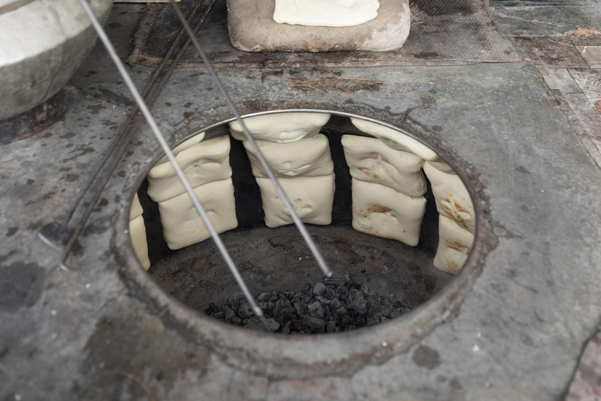 The square shaped bread is believed to have originated in Purani Haveli in Hyderabad, India. The square shaped bread is believed to have originated in Purani Haveli in Hyderabad, India.