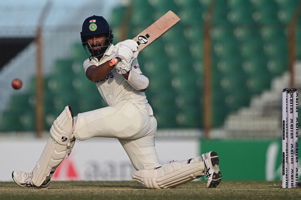 Aggressive approach: Pujara notched up his 19th ton, his fastest ever.