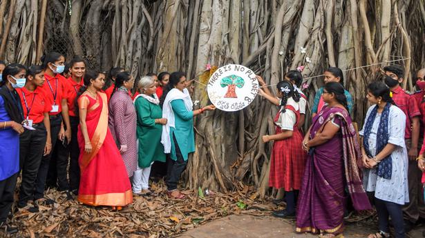 Students tie rakhi to 150-year-old banyan tree in Visakhapatnam