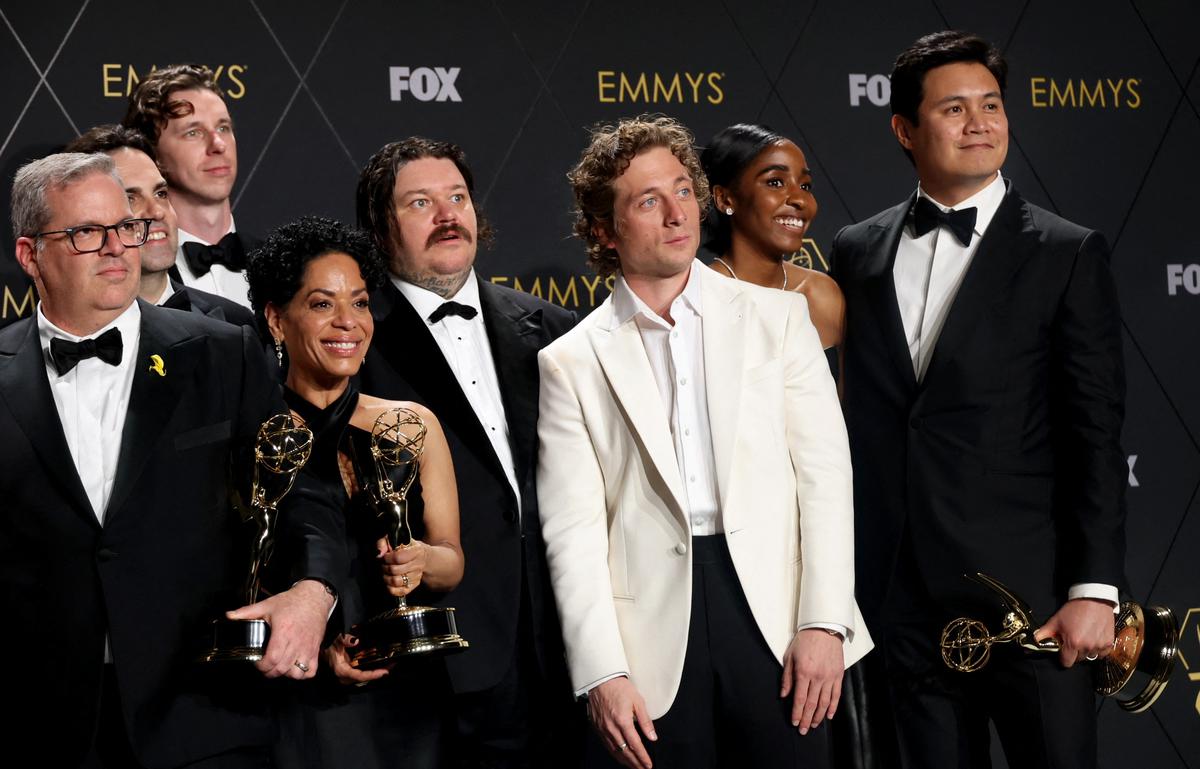 Jeremy Allen White, Ayo Edebiri, and cast members of 'The Bear' pose together with awards, at the 75th Primetime Emmy Awards in Los Angeles, California, U.S., January 15, 2024. REUTERS/Aude Guerrucci