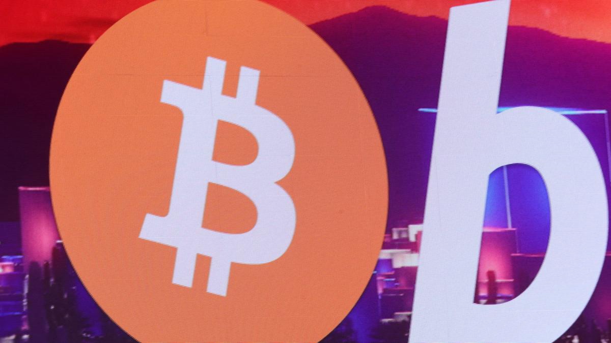 Bitcoin soars to all-time peak just shy of 2,000