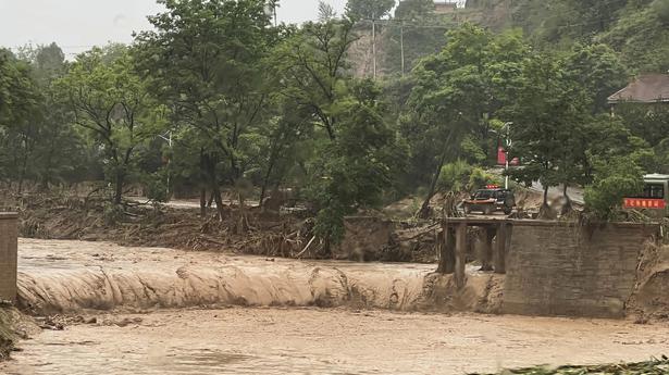 China floods leave at least 12 dead, thousands evacuated