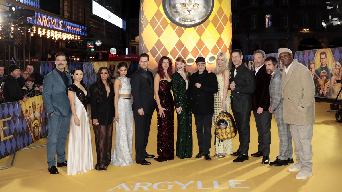 ‘Argylle’ stars Henry Cavill, Dua Lipa, Bryan Cranston keep spy thriller under wraps on red carpet