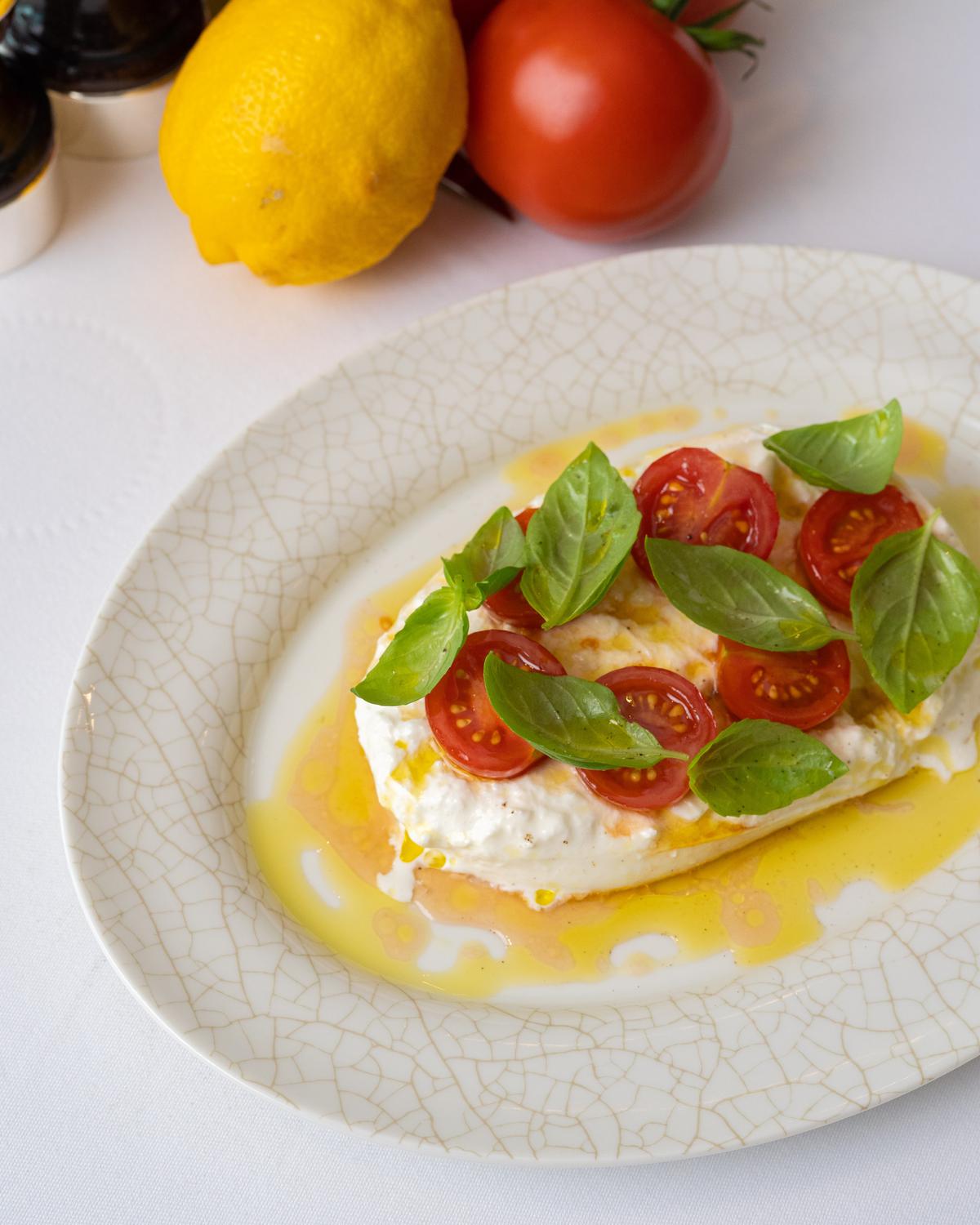 Burrata with cherry tomatoes and basil at LPM