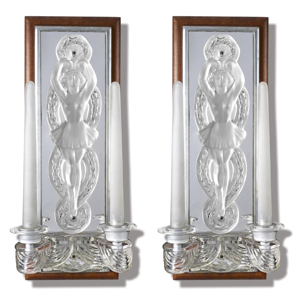 A pair of glass figural sconces by Marc Lalique.
Size: 20.5 x 6 x 4.2 inches each;
Medium: Glass;
Circa: 1950;
Estimate: ₹10,00,000-₹12,00,000. A pair of glass figural sconces by Marc Lalique.
Size: 20.5 x 6 x 4.2 inches each;
Medium: Glass;
Circa: 1950;
Estimate: ₹10,00,000-₹12,00,000.