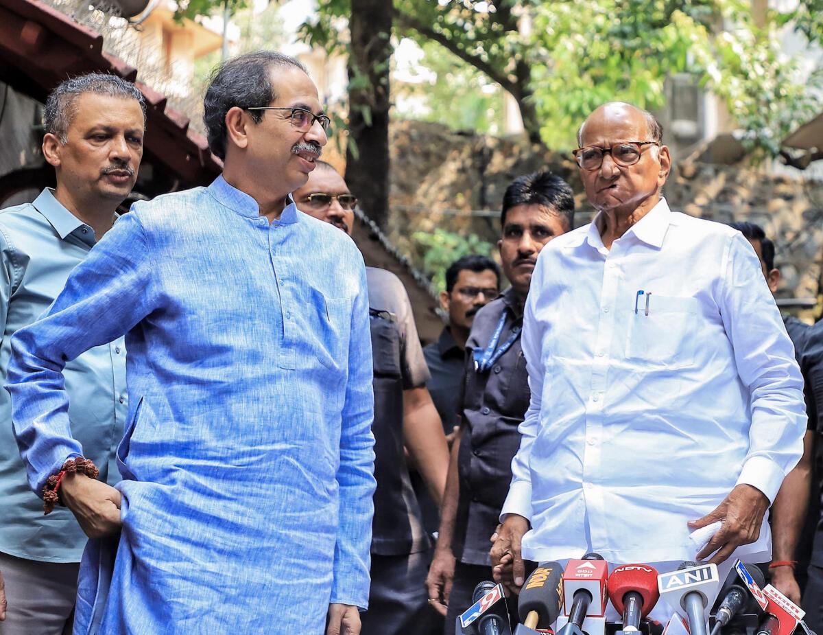 Mumbai, Nov 05 (ANI): NCP-SCP chief Sharad Pawar with Shiv Sena (Uddhav Balasaheb Thackeray) chief Uddhav Thackeray during a joint press conference ahead of the Maharashtra Assembly election, at Silver Oak in Mumbai on Monday