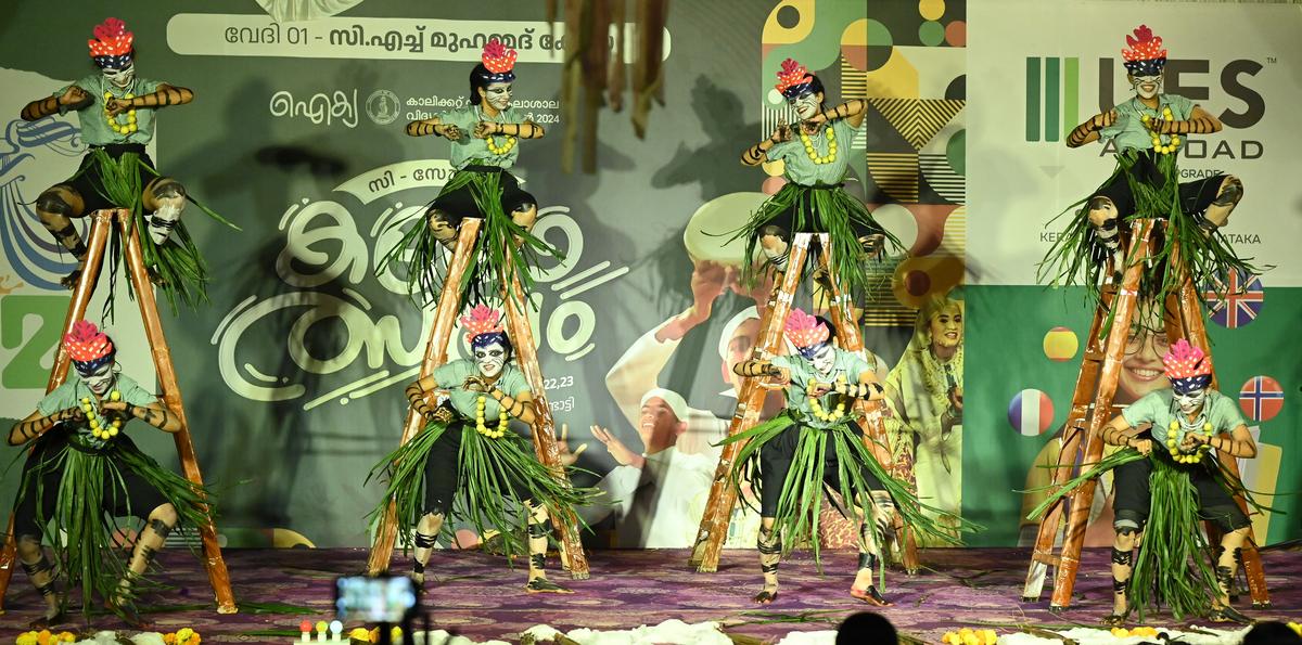 Students of DGMMES College, Mampad, performing folk dance.
