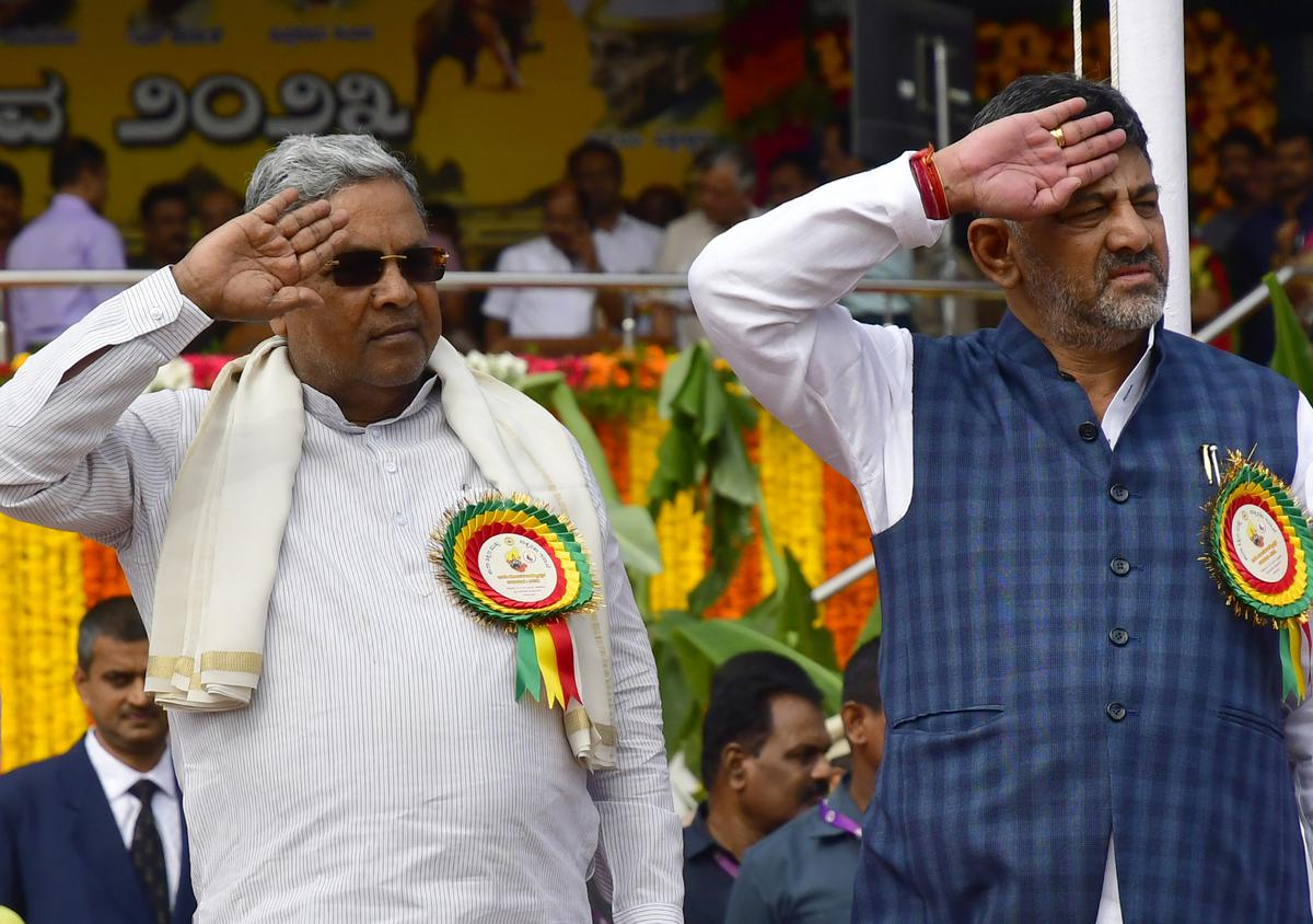 Karnataka Chief Minister Siddaramaiah and Deputy Chief Minister D.K. Shivakumar during the Kannada Rajyotsava celebrations, at the Kanteerava Stadium in Bengaluru on November 01, 2023. 