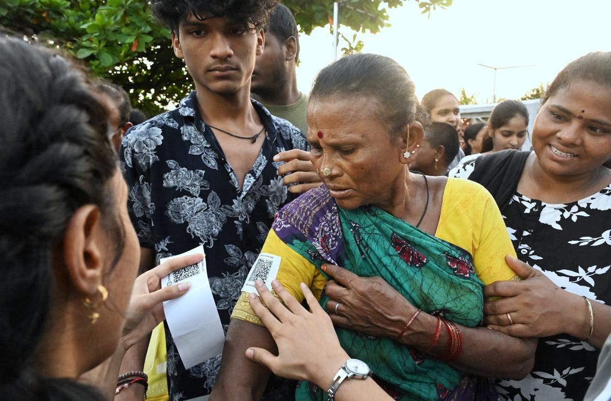 Volunteers helping public arriving to participate in the International Yoga Day celebrations on the Beach Road, in Visakhapatnam on Saturday (June 21, 2025). 