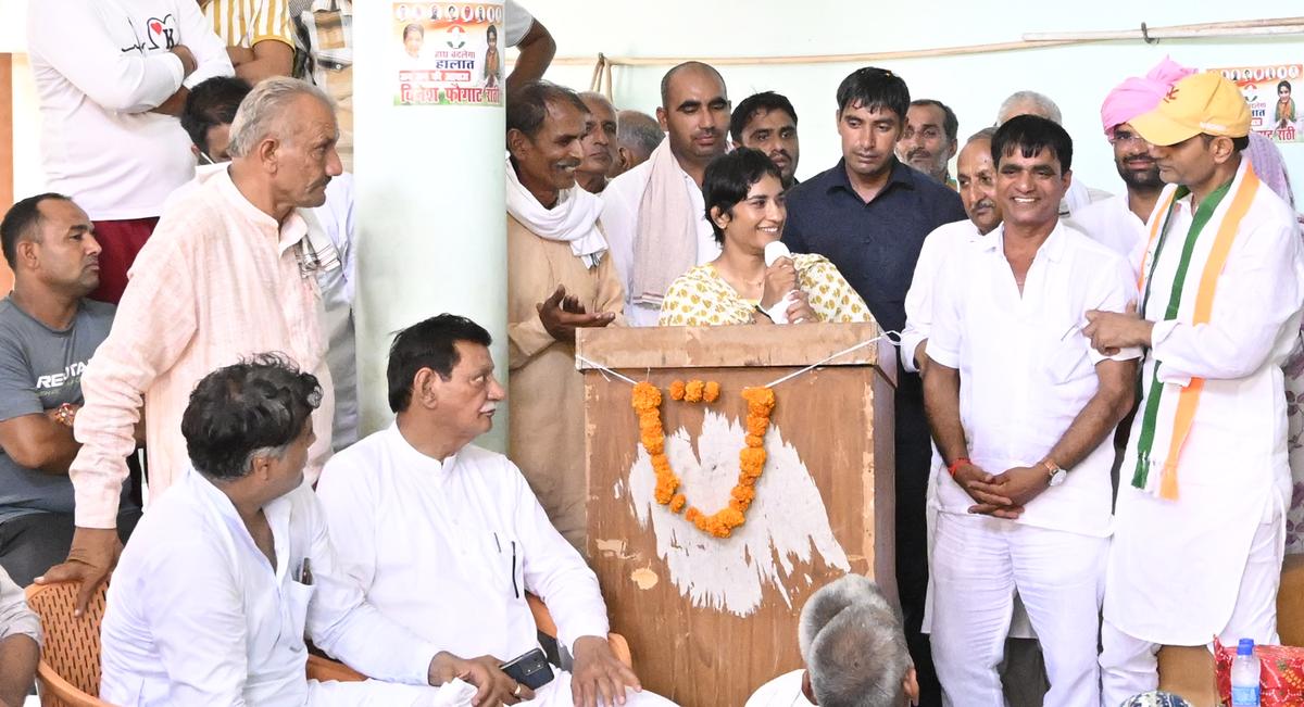 Vinesh Phogat addressing a public meeting in Chabri village in Haryana’s Jind. 